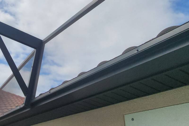 screen enclosure attached to super gutters